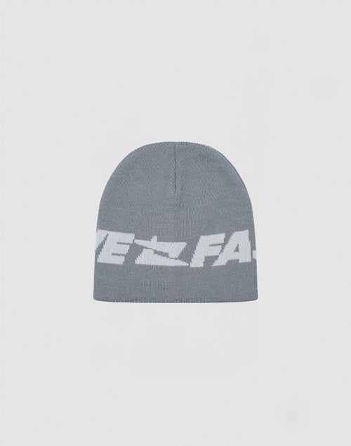 The Live Fast Jacquard Beanie by LIVE FAST DIE YOUNG is a soft gray polyacryl knit with a bold white Logo Strick graphic and partially visible text on the front. Model: LF2410-16486.