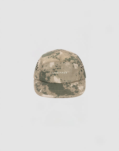 The LIVE FAST DIE YOUNG Live Fast 5 Panel Cap, made from durable nylon in a camouflage pattern, features LIVE FAST embroidered in white on the front and is shown on a plain light gray background.