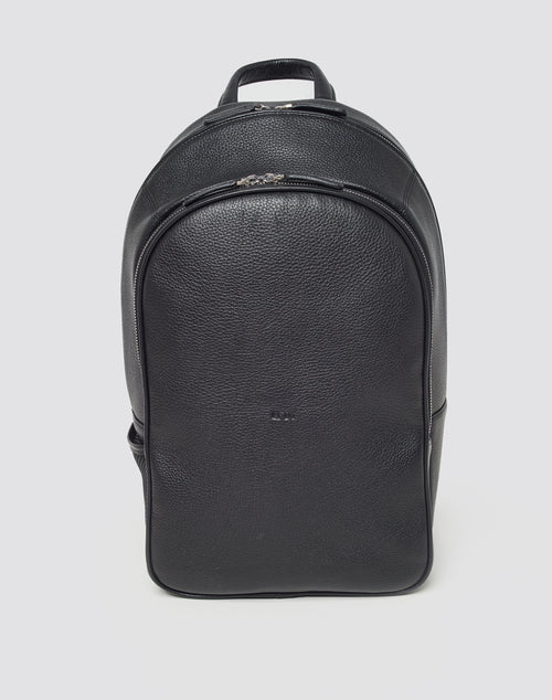 The LFDY Leather Backpack by LIVE FAST DIE YOUNG is a black, textured Rindsleder bag with a zippered main compartment, top handle, and practical Laptop Fach. Displayed on a plain light background.