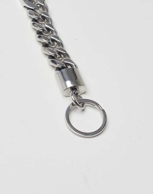 A close-up of the LFDY Cuban Lanyard by LIVE FAST DIE YOUNG, made of stainless steel with thick links and a cylindrical clasp attached to a round keyring, set against a plain white background.
