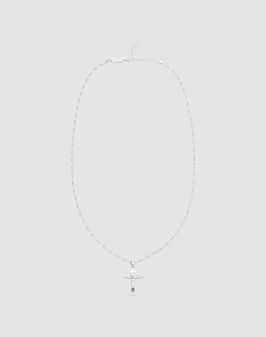 The LIVE FAST DIE YOUNG Cross Pendant is a delicate silver necklace featuring a small cross crafted from 925 Sterling Silver, shown against a plain light gray background.