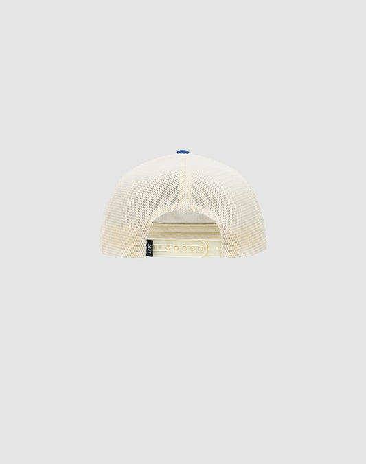 The LFDY Patched Trucker by LIVE FAST DIE YOUNG is a beige mesh-back cap, shown from the back with an adjustable white snap closure and a small black logo tag on the left side. The background is plain light gray.