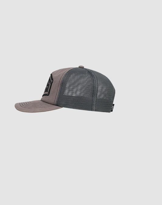 Side view of the gray LFDY Rivet Trucker cap by LIVE FAST DIE YOUNG, with a mesh back, solid front panel, slightly curved brim, and a black Flag-Label tag on the mesh. Set against a plain light gray background.