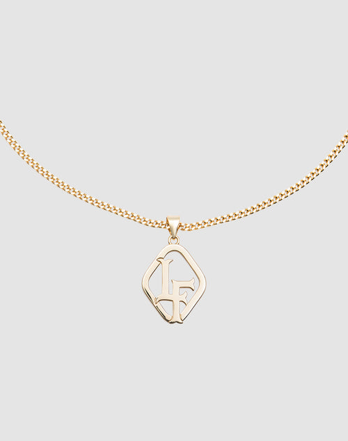 The LF Blank Chain by LIVE FAST DIE YOUNG is a gold geometric necklace with intertwined L and F pendant, crafted from 925 vergoldet Sterling Silber, featuring an adjustable chain length, shown on a light gray background.