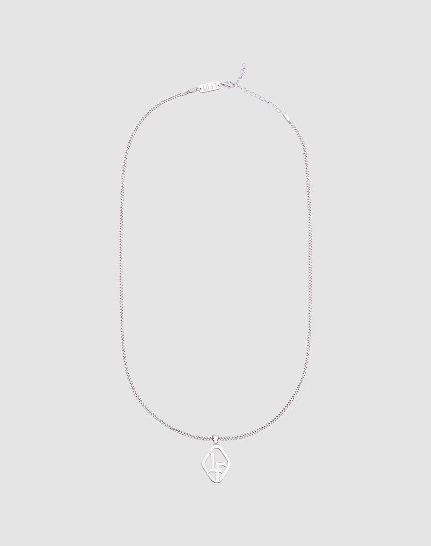 The LF Blank Chain by LIVE FAST DIE YOUNG is a 925 Sterling Silver necklace with a diamond-shaped stylized LF pendant, shown on a light gray background. Adjustable length ensures the perfect fit.