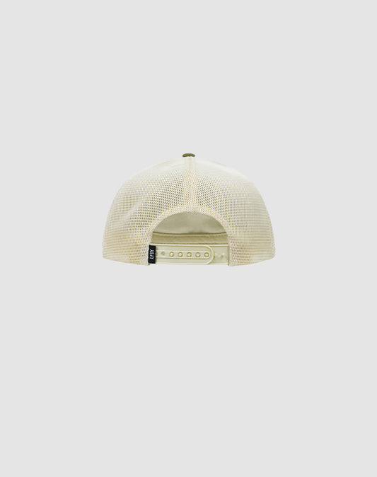 The LFDY Patched Trucker by LIVE FAST DIE YOUNG is shown from the back in beige mesh, with an adjustable Snapverschluss and a small black Logo-Stick tag on the left side. Background is plain light gray.