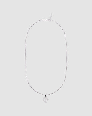 The DY Chain by LIVE FAST DIE YOUNG features a sterling silver necklace with an intricate overlapping E and V pendant, shown on a light gray background. Adjustable length ensures the perfect fit.