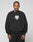 A man with braided hair wears the oversize DY Sweater by LIVE FAST DIE YOUNG, featuring black raglan sleeves and a white chest graphic. He stands against a plain light background with a neutral expression.