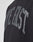 Close-up of the LIVE FAST DIE YOUNG Live Fast College Hooded, a black oversized hoodie featuring bold, matte raised LIVE FAST lettering across the back.