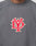 Someone wears the DY Sweater by LIVE FAST DIE YOUNG, an oversize grey sweatshirt with Raglan sleeves and a bold red and white embroidered LIVE FAST DIE YOUNG patch on the chest.