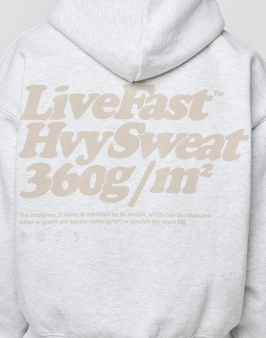 The Basic 360 Hooded by LIVE FAST DIE YOUNG is a light gray, oversized cotton hoodie with large beige Live Fast Hvy Sweat 360g/m² text on the back and smaller front and back prints describing the thick fabrics weight.