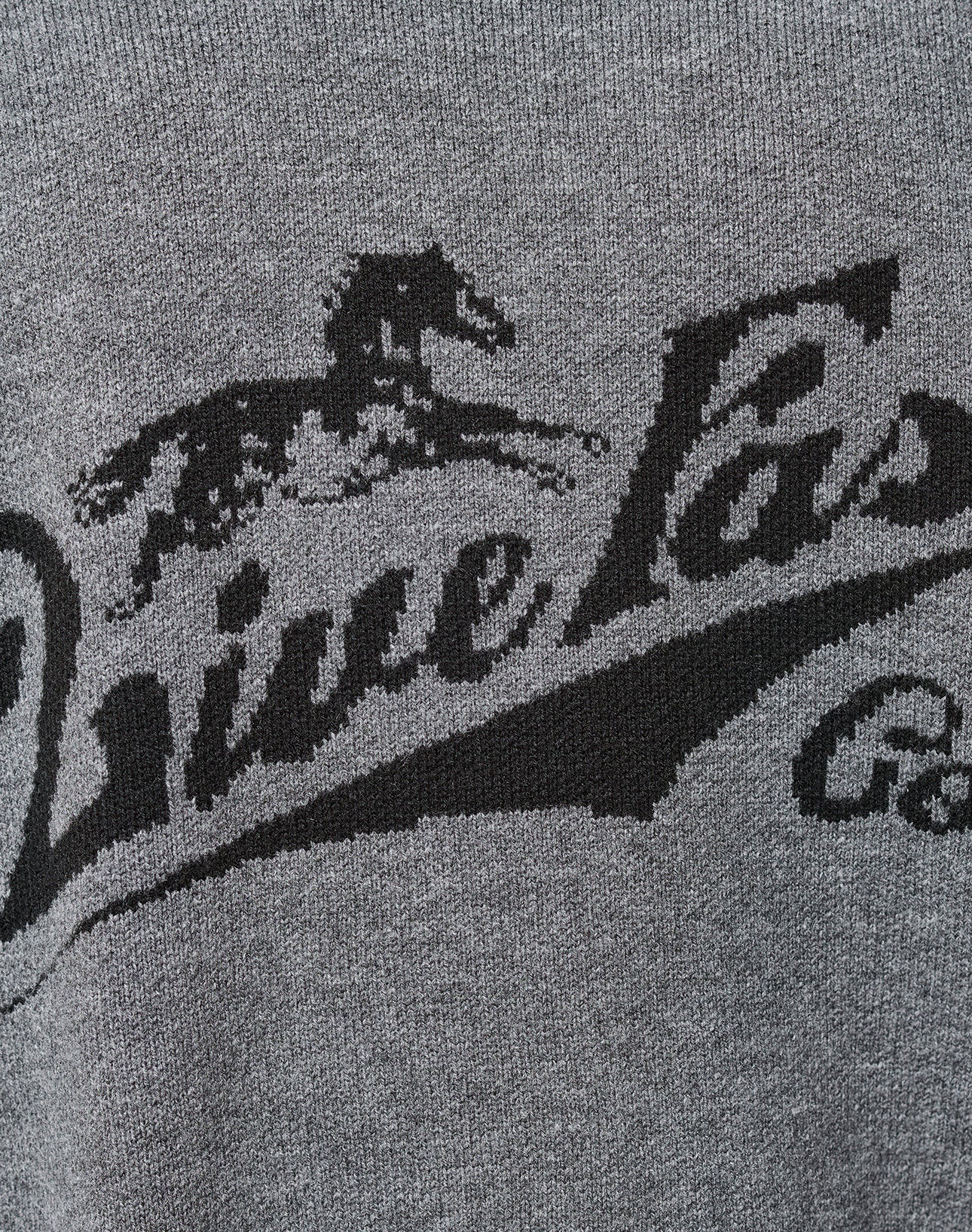 Close-up of gray fabric on the Boxy Knit Zip Jacket by LIVE FAST DIE YOUNG featuring raglan sleeves and a black galloping horse graphic above stylized "Live Fast" text.