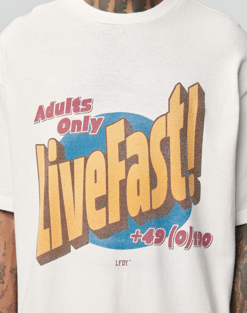 A close-up of the LFDY Adults Only Tee by LIVE FAST DIE YOUNG, featuring colorful bold Adults only LiveFast! +49(0)/10 text and a small LFDY print below on 100% white Baumwolle Vintage Pilling fabric.