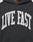 A close-up of the Live Fast College Hooded by LIVE FAST DIE YOUNG, an oversized black hoodie with LIVE FAST boldly printed in large white letters across the chest.