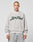 A person with a shaved head models the LIVE FAST DIE YOUNG LFDY Script Sweater—an oversize gray sweatshirt with bold green “Live Fast” text and raglan sleeves—facing forward against a plain light gray background.