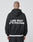 From behind, a person with short hair wears the LIVE FAST DIE YOUNG LF Vulgar Hooded Zip in black, featuring an Oversize Fit and bold white LIVE FAST ITS VULGAR lettering on the back.