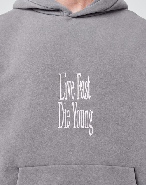 A close-up of the LFDY Stitched Hooded by LIVE FAST DIE YOUNG shows its oversized fit and white Live Fast Die Young embroidery on the front.