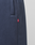 Close-up of navy blue LFDY Heavyweight Loungepants by LIVE FAST DIE YOUNG in 100% cotton, featuring a ribbed waistband, side pocket, and a small red fabric tag with white text on the side seam.