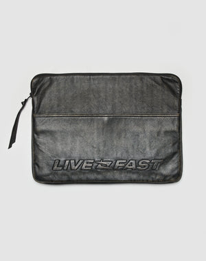 The LFDY Laptop Leather Case by LIVE FAST DIE YOUNG is a black Rindsleder sleeve featuring a front zipper pocket, embossed LIVE FAST logo across the bottom, and an inner pocket for organization.
