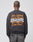 A person in the LIVE FAST DIE YOUNG Live Fast NY Sweater—an oversized black sweatshirt with orange Jim Jones Live Fast front and back print plus white graffiti-style New York text—paired with faded black jeans. Cotton-polyester blend. Viewed from the back.
