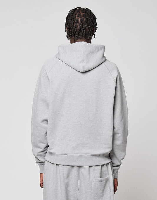 A person with short, twisted hair is facing away from the camera, wearing a light gray LIVE FAST DIE YOUNG LFDY Embroidery Hooded and matching sweatpants against a plain white background.