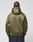 A person with short hair, seen from behind, is wearing a LIVE FAST DIE YOUNG LFDY Scuba Hooded Zip in olive green with zip pockets. The dark, loose Regular Fit pants complete the look against a plain light background.