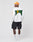 A man faces away, wearing the LIVE FAST DIE YOUNG No Rich Parents Longsleeve in white with bold green and yellow back text, paired with black cargo shorts, white socks, sneakers, and an orange cap. Regular fit ensures comfort.