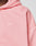 Close-up of a person wearing the Basic Hooded Zip by LIVE FAST DIE YOUNG in light pink, featuring a small white LFDY™ chest logo. The cropped fit shows part of the face, neck, shoulder, and upper chest for a sleek branded look.