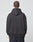 A person with short hair, seen from behind, is wearing the black LIVE FAST DIE YOUNG Live Fast Die Young Hooded with the hood down and dark jeans against a plain light gray background. The hoodie has a subtle Vintage Effekt for a timeless look.