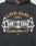 The LIVE FAST DIE YOUNG Live Fast Tribal Hooded is a black oversized hoodie with orange and white LIVE FAST DY LIMONE HARLEM, NY text and stylized silver graphic lettering at the center.