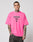 A person with neck and arm tattoos wears a bright pink LFDY Triple Racing Tee by LIVE FAST DIE YOUNG, featuring a multilogo front print with LIVE FAST and CF, standing against a plain light background.