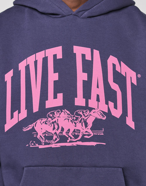 The Live Fast Stallion Hooded by LIVE FAST DIE YOUNG is a dark, oversized cotton hoodie with a bold pink LIVE FAST front print above two jockeys racing horses in pink.