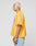 A person with short, bleached blonde hair wears the LIVE FAST DIE YOUNG LFDY Boxy Jersey and light blue jeans, standing in profile against a plain light gray background.