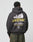 A person wears the LFDY Supply Hooded by LIVE FAST DIE YOUNG, an oversized black Baumwolle-Polyester hoodie with a building graphic and bold yellow LIVEFAST print, plus contact info and locations like UK, Germany, and Netherlands on the back.