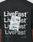 Back of the black Basic Evidence Tee by LIVE FAST DIE YOUNG with "LiveFast" four times in bold white, a crumpled receipt image over the text, small symbols, 100% Baumwolle, front/back print, and website link at the bottom.