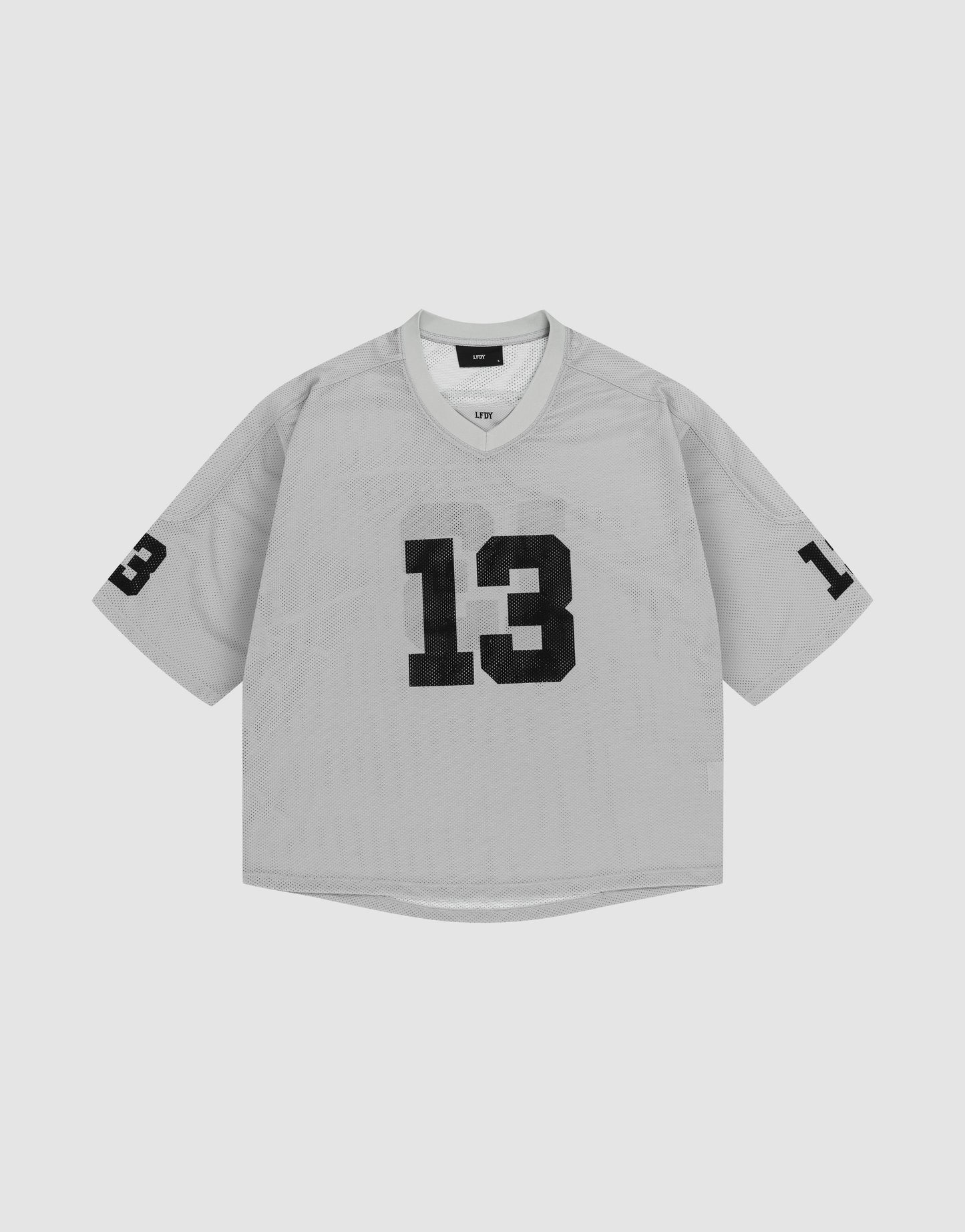 The LFDY Mesh Jersey by LIVE FAST DIE YOUNG is a gray oversized polyester sports shirt with short sleeves, a V-Ausschnitt collar, and bold black number 13 on the front and left sleeve.