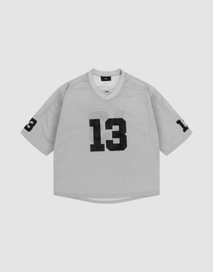 The LFDY Mesh Jersey by LIVE FAST DIE YOUNG is a gray oversized polyester sports shirt with short sleeves, a V-Ausschnitt collar, and bold black number 13 on the front and left sleeve. | plain