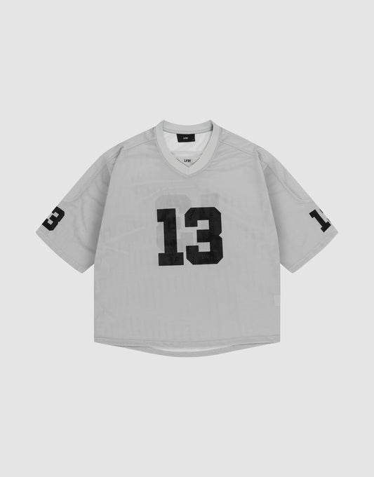 The LFDY Mesh Jersey by LIVE FAST DIE YOUNG is a gray oversized polyester sports shirt with short sleeves, a V-Ausschnitt collar, and bold black number 13 on the front and left sleeve. | plain
