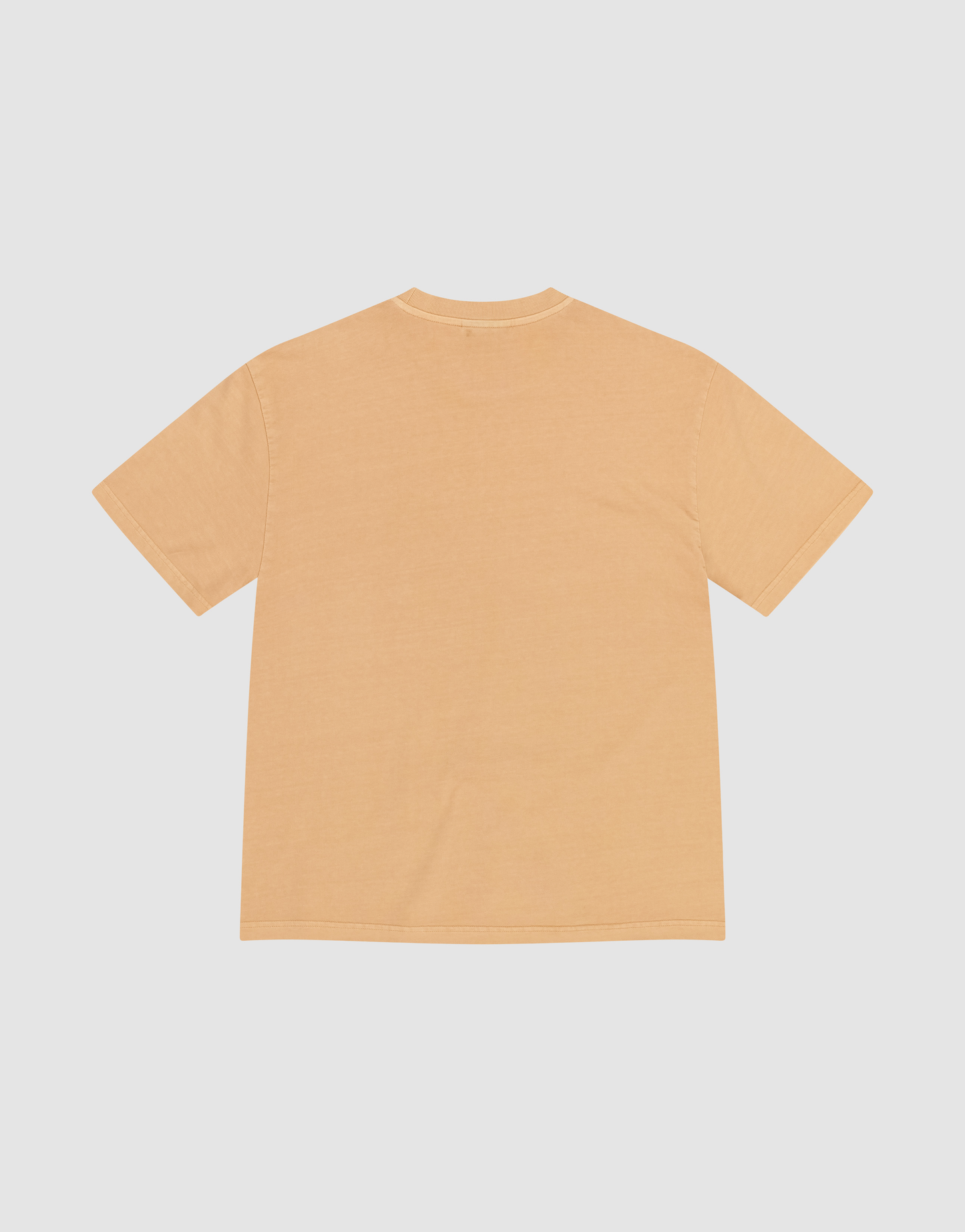 The LFDY Flames Chest Tee by LIVE FAST DIE YOUNG is a plain, short-sleeved light orange T-shirt made from 100% Baumwolle, shown laid flat on a white background with the back facing up.
