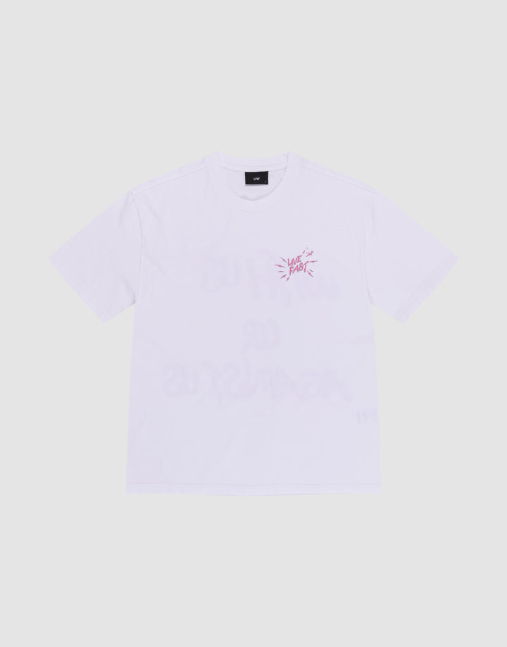 The LFDY Against Us Tee by LIVE FAST DIE YOUNG is a plain white, 100% Baumwolle short-sleeve shirt with a small pink front print and text on the left chest, shown laid flat on a light grey background.