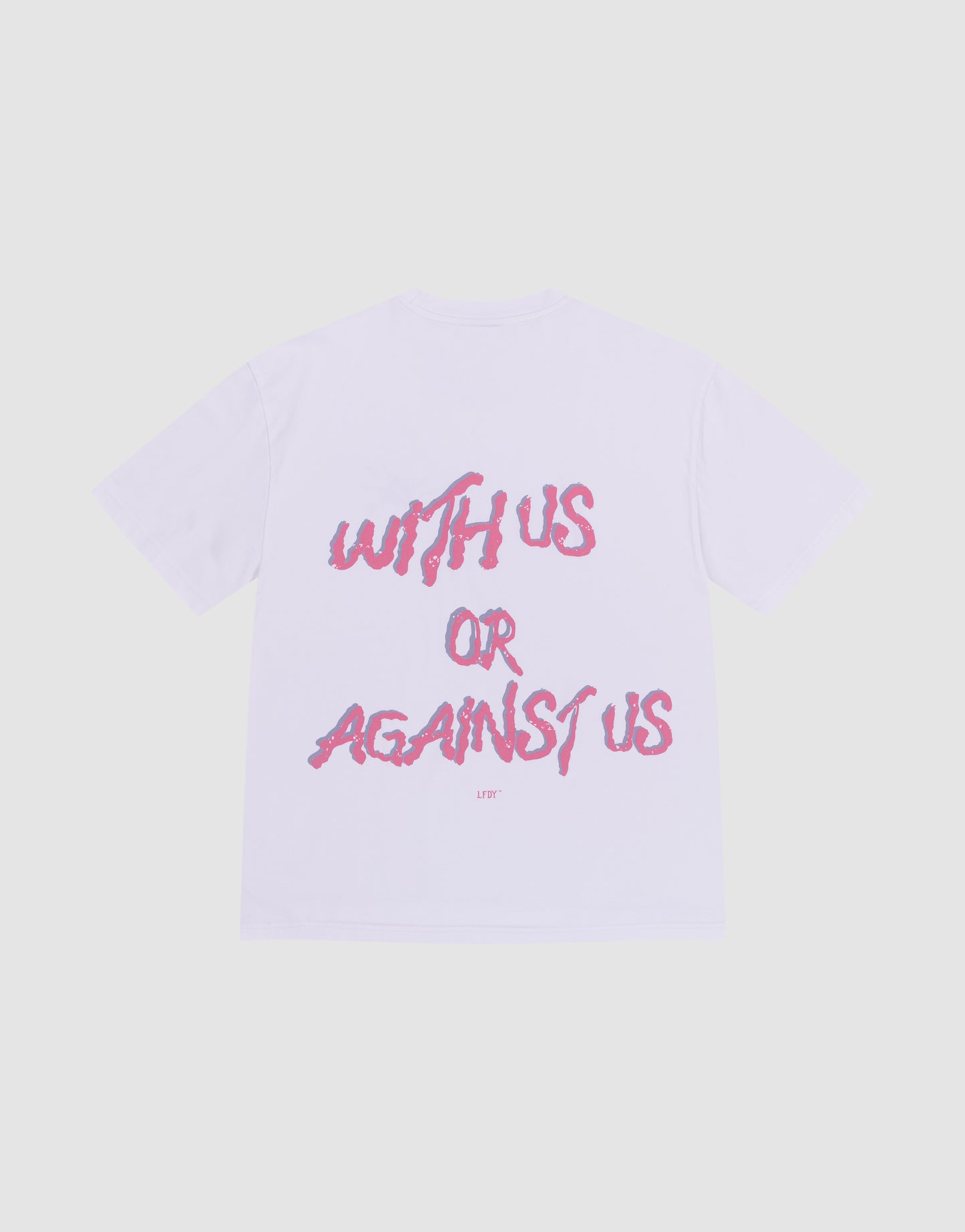The LFDY Against us Tee by LIVE FAST DIE YOUNG is a white, oversized 100% cotton T-shirt with bold pink "WITH US OR AGAINST US" brushstroke text on the back and a subtle LFTF underneath.