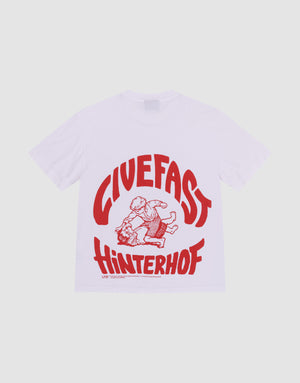 The LFDY Hinterhof Tee by LIVE FAST DIE YOUNG is a white, oversized 100% cotton T-shirt featuring a bold red graphic of two wrestlers and striking GIVEFAST HINTERHOF backprint. | plain