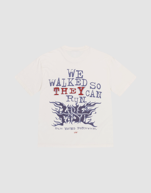The LFDY We Walked Tee by LIVE FAST DIE YOUNG is an oversize white t-shirt made from 100% Baumwolle, with bold front and back prints featuring “WE WALKED SO THEY CAN RUN,” purple flames, and “DAYS YOUNG FOREVER” on the back. | plain