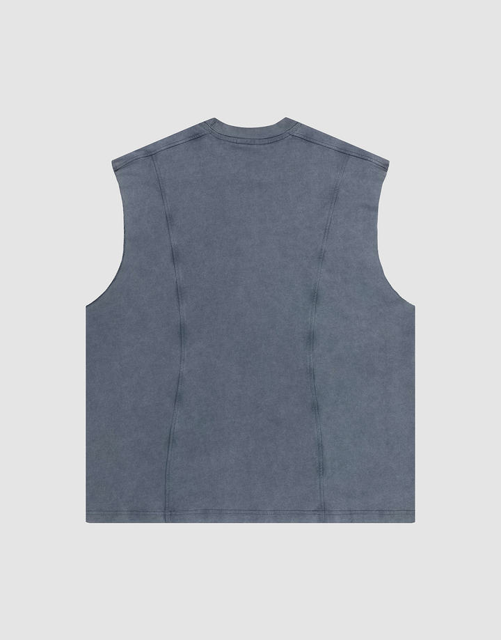 The Heavy Muscle Tank by LIVE FAST DIE YOUNG is a sleeveless, oversized faded blue-gray vest, shown flat from the back with visible seam lines, no fastenings or decorations, and crafted from 100% Baumwolle for comfort.