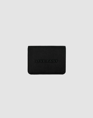 A black LFDY Cardholder by LIVE FAST DIE YOUNG features a textured surface, card slots, and "LIVE FAST" embossed on the front, shown against a plain light gray background.