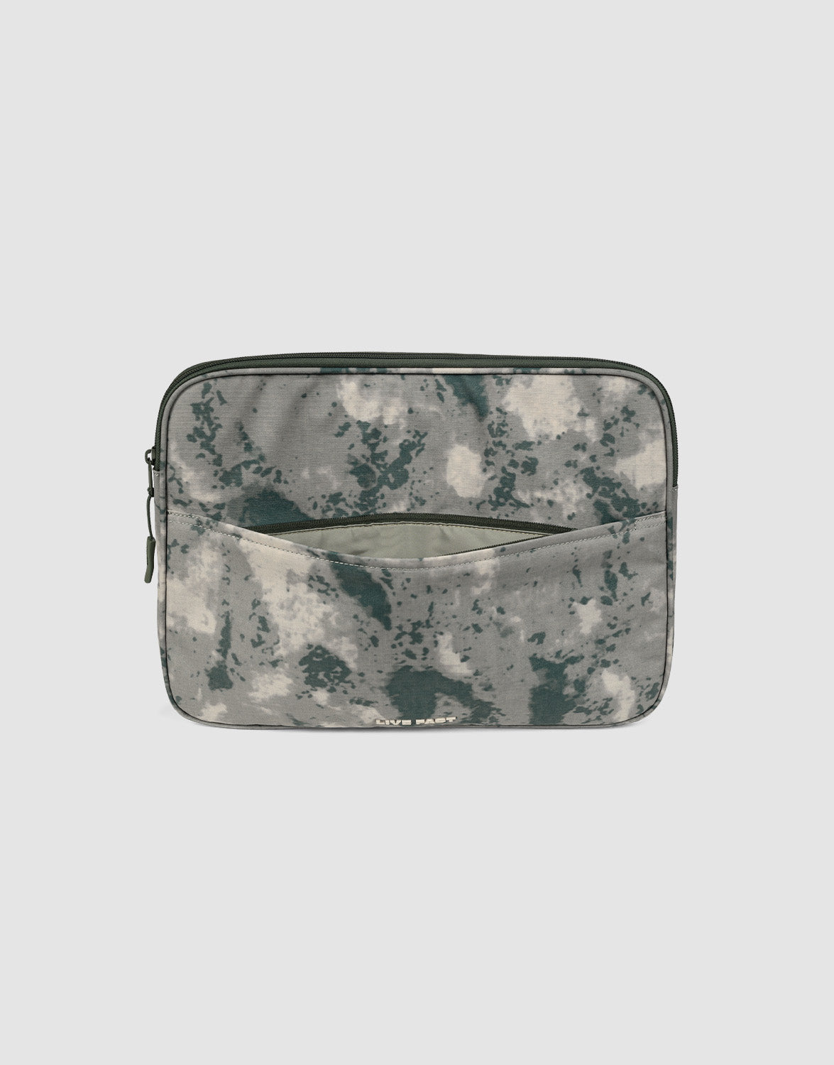 The LFDY Laptop Case by LIVE FAST DIE YOUNG is a rectangular zippered pouch with a green and gray camouflage pattern, front pocket, and visible side zip pocket, shown against a plain light background.