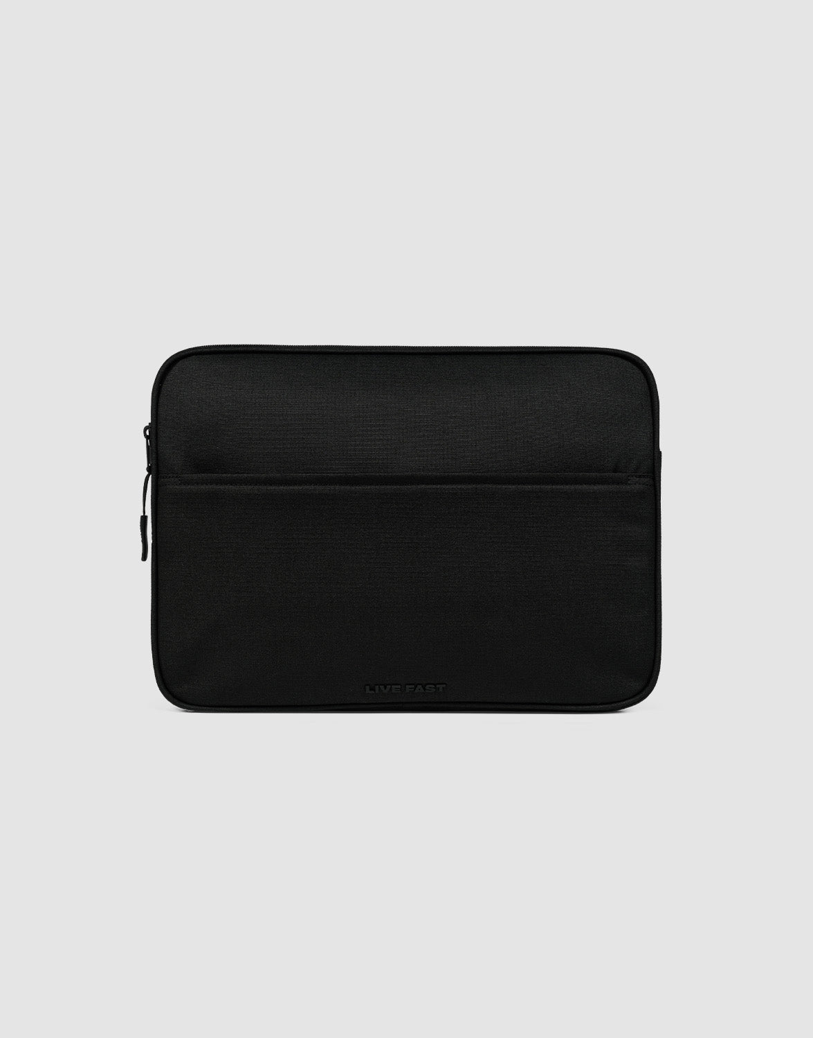 The LFDY Laptop Case by LIVE FAST DIE YOUNG is a black polyester sleeve with a front zippered pocket, shown on a light gray background. It showcases a simple, minimalist design.