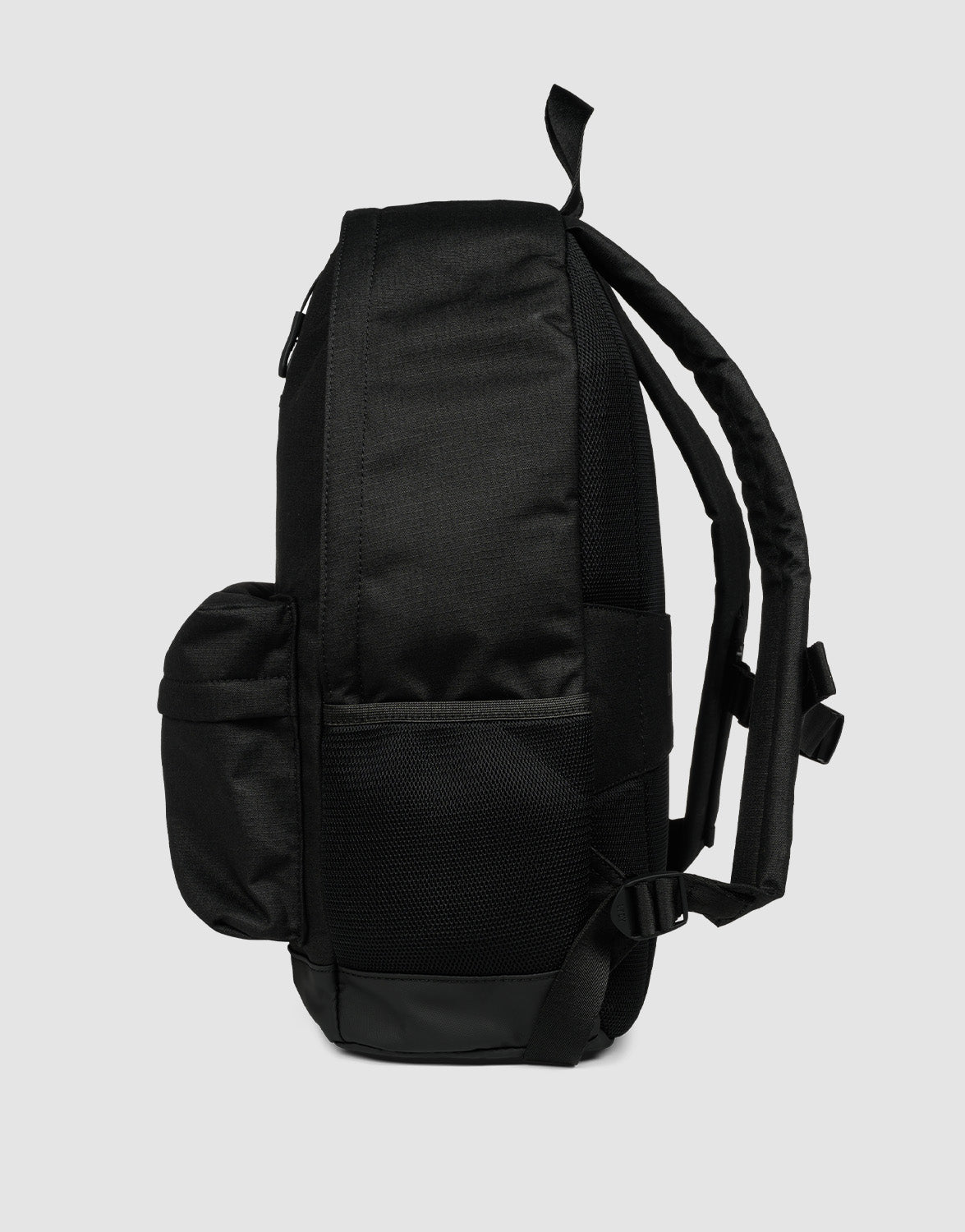 The LFDY Backpack by LIVE FAST DIE YOUNG is shown from the side on a plain gray background. This black bag features a 19L capacity, verstellbare Schultergurte, a front pocket, and a mesh side pocket.