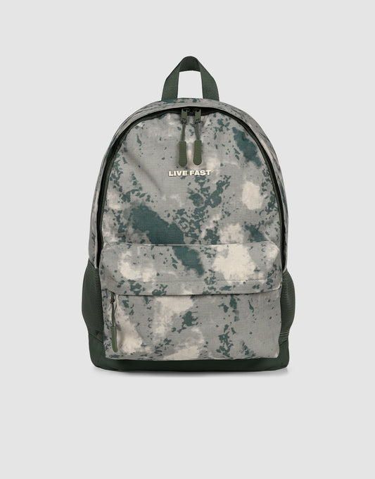 The LFDY Backpack by LIVE FAST DIE YOUNG is a gray-green camouflage 19L laptop rucksack with a large front pocket, black zippers, adjustable shoulder straps, and "LIVE FAST" printed near the top, shown against a plain light background.
