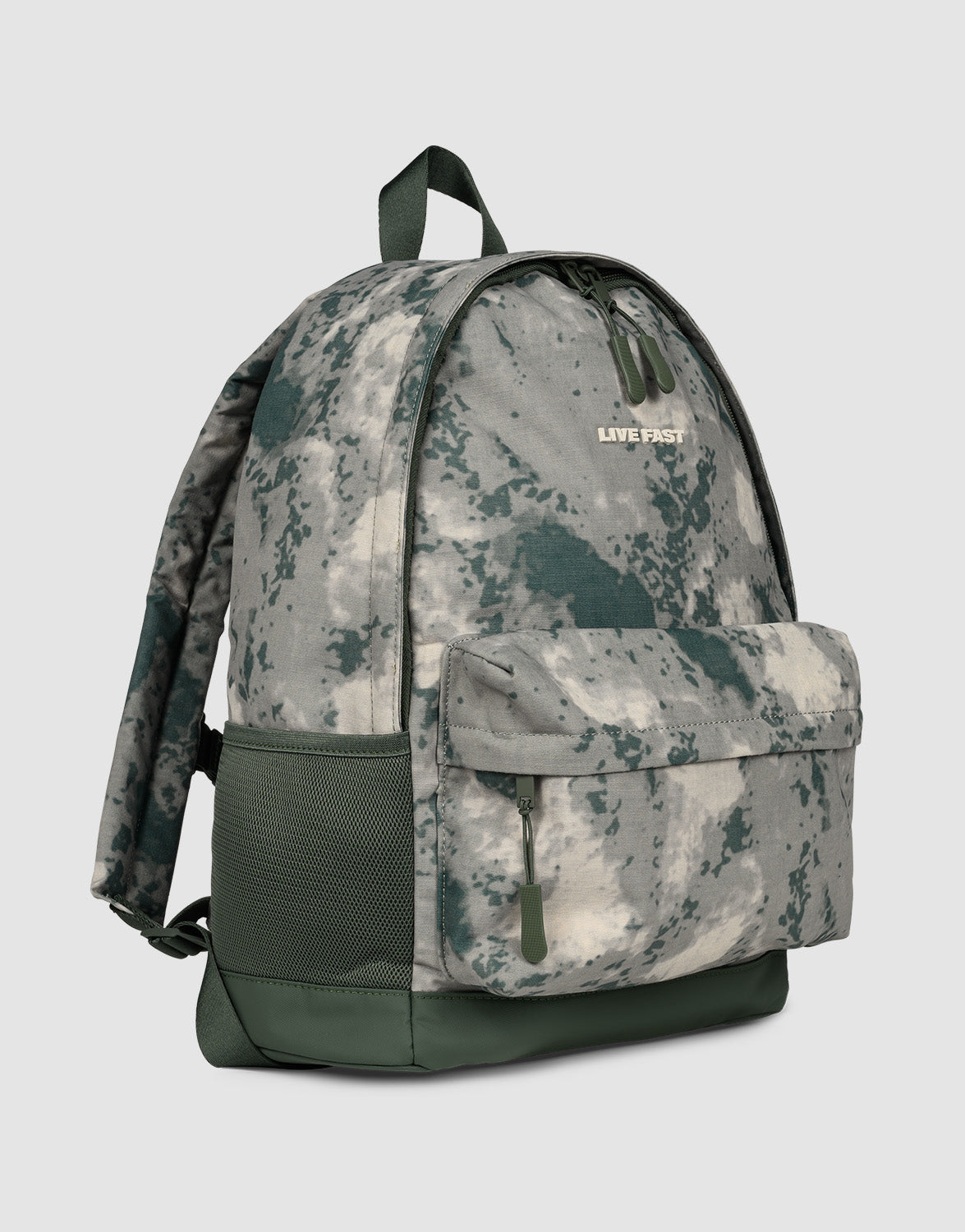 The LFDY Backpack by LIVE FAST DIE YOUNG is a green and gray camo 19L laptop rucksack with a front zipper pocket, side mesh pocket, top handle, adjustable shoulder straps, and "LIVE FAST" text on the front.